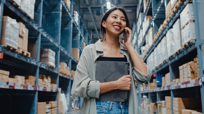Happy warehouse worker with problems solved